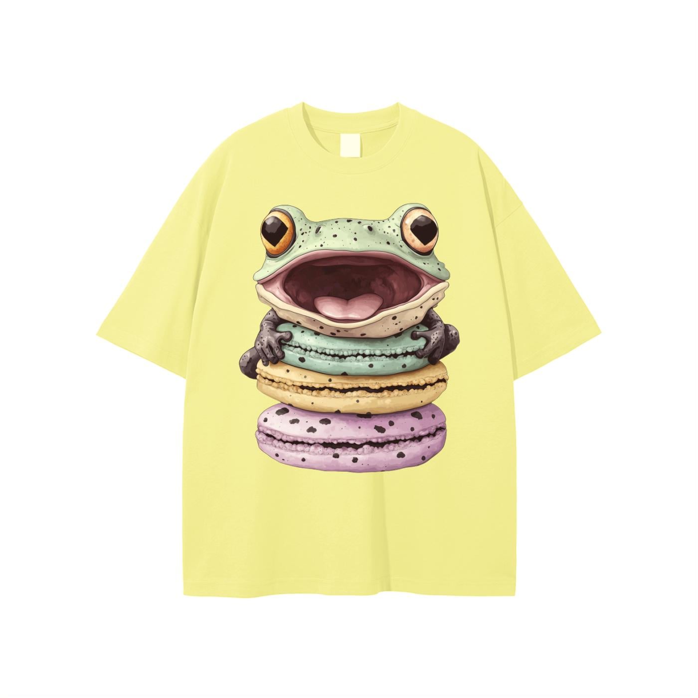 Yellow cotton t-shirt with pastel tree frog and macaron graphic, cute kawaii streetwear for festivals.